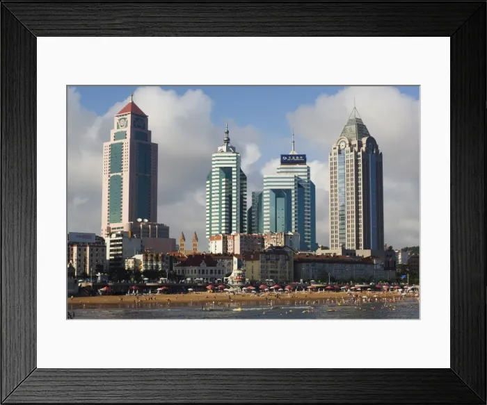 Framed Print : Modern skyscrapers in the seaside beach resort and host of the sailing events of the 2008 Olympic Games, Qingdao, Shandong Province Framed Print : Modern skyscrapers in the seaside beach resort and host of the sailing events of the 2008 Olympic Games, Qingdao, Shandong Province
