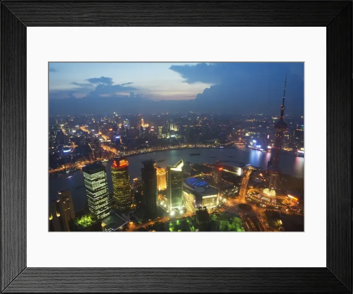 Framed Print : Car light trails on the Bund and The Oriental Pearl Tower illuminated in Pudong new area Framed Print : Car light trails on the Bund and The Oriental Pearl Tower illuminated in Pudong new area