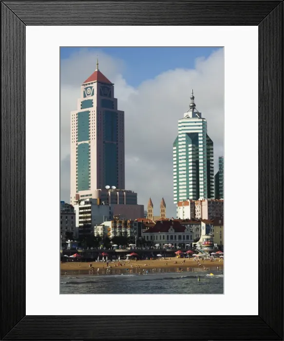 Framed Print : Modern skyscrapers in the seaside beach resort and host of the sailing events of the 2008 Olympic Games, Qingdao, Shandong Province Framed Print : Modern skyscrapers in the seaside beach resort and host of the sailing events of the 2008 Olympic Games, Qingdao, Shandong Province