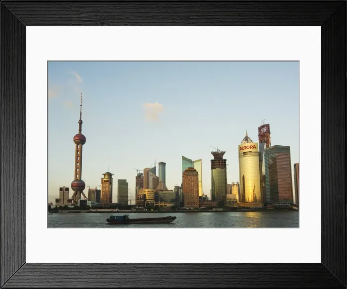 Framed Print : The Oriental Pearl Tower and modern buildings on the skyline in Pudong new area on the banks of Huangpu River, Pudong, Shanghai
