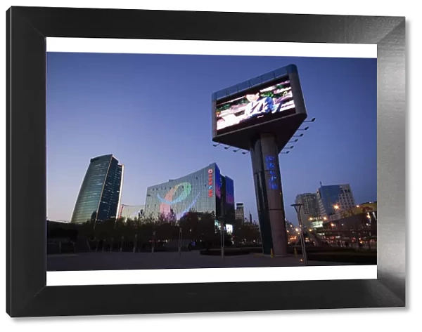 A giant television screen and The Sinosteel building in Zhongguancun, Chinas biggest computer