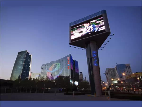 A giant television screen and The Sinosteel building in Zhongguancun, Chinas biggest computer