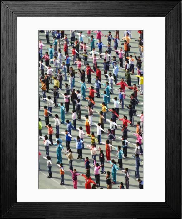 Framed Print : Junior school children exercising in colourful clothes, Beijing, China, Asia Framed Print : Junior school children exercising in colourful clothes, Beijing, China, Asia