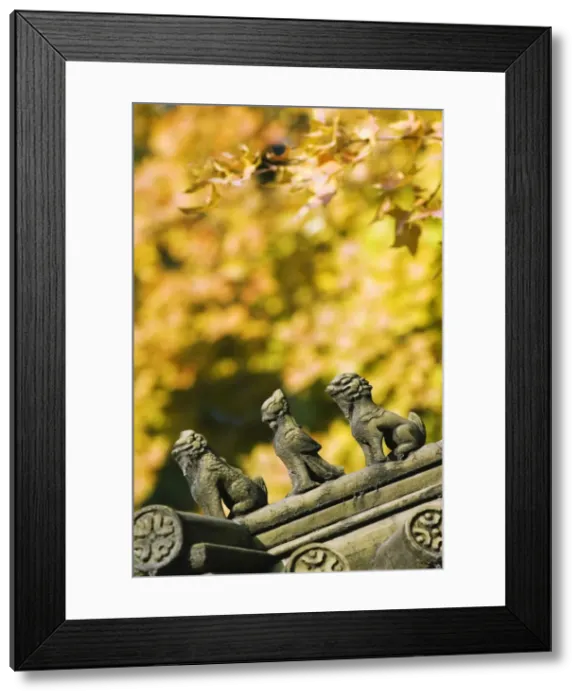 Framed Print : Autumn colours and ornamental Chinese style decorative figures on a pavilion in Ritan Park Framed Print : Autumn colours and ornamental Chinese style decorative figures on a pavilion in Ritan Park