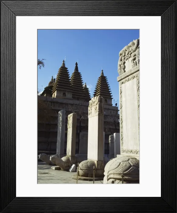 Framed Print : A five towered temple and ancestral tombs inscribed with dead persons contributions Framed Print : A five towered temple and ancestral tombs inscribed with dead persons contributions