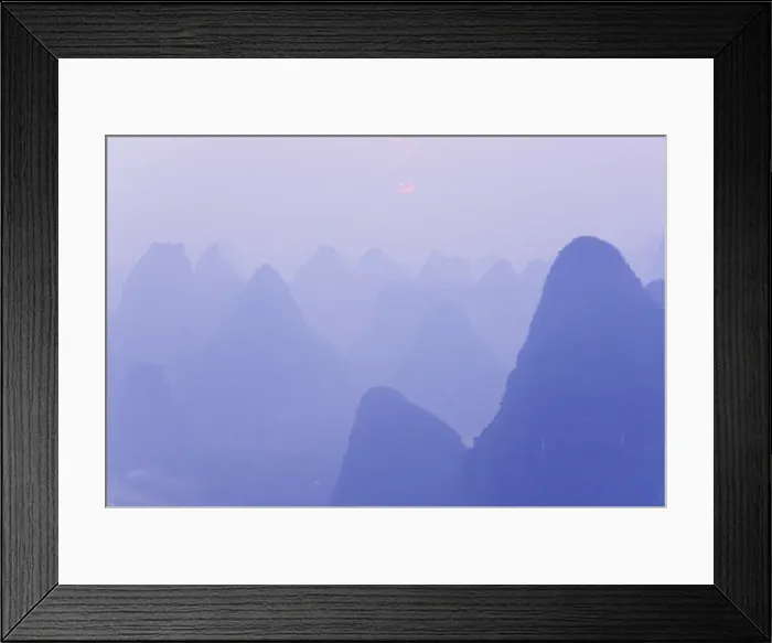Framed Print : Karst landscape, haze and rising sun, Yangshuo, Guangxi Province, China, Asia Framed Print : Karst landscape, haze and rising sun, Yangshuo, Guangxi Province, China, Asia