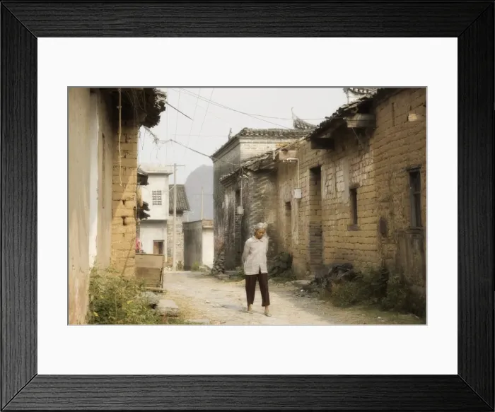 Framed Print : Woman walking through village streets, Yangshuo, Guangxi Province, China, Asia Framed Print : Woman walking through village streets, Yangshuo, Guangxi Province, China, Asia