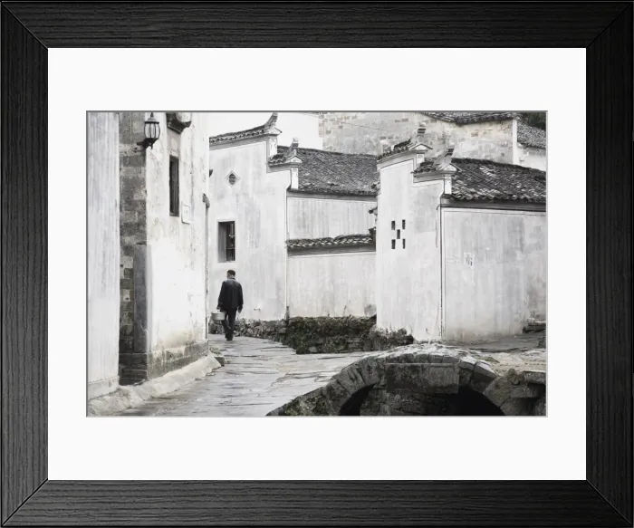 Framed Print : Man walking in the street, Xi Di (Xidi) village, UNESCO World Heritage Site Framed Print : Man walking in the street, Xi Di (Xidi) village, UNESCO World Heritage Site