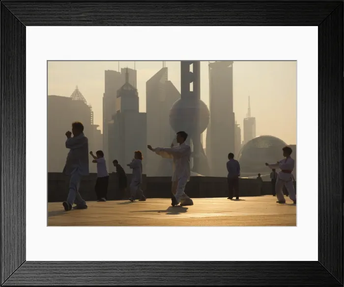 Framed Print : Morning exercise against the background of Lujiazui Finance and trade zone Framed Print : Morning exercise against the background of Lujiazui Finance and trade zone