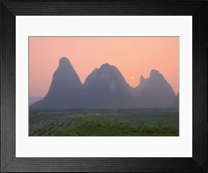 Framed Print : Karst landscape and setting sun, Yangshuo, Guangxi Province, China, Asia Framed Print : Karst landscape and setting sun, Yangshuo, Guangxi Province, China, Asia