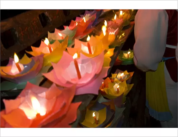 Selling floating prayer candles, night, Lijiang old town, Yunnan, China, Asia