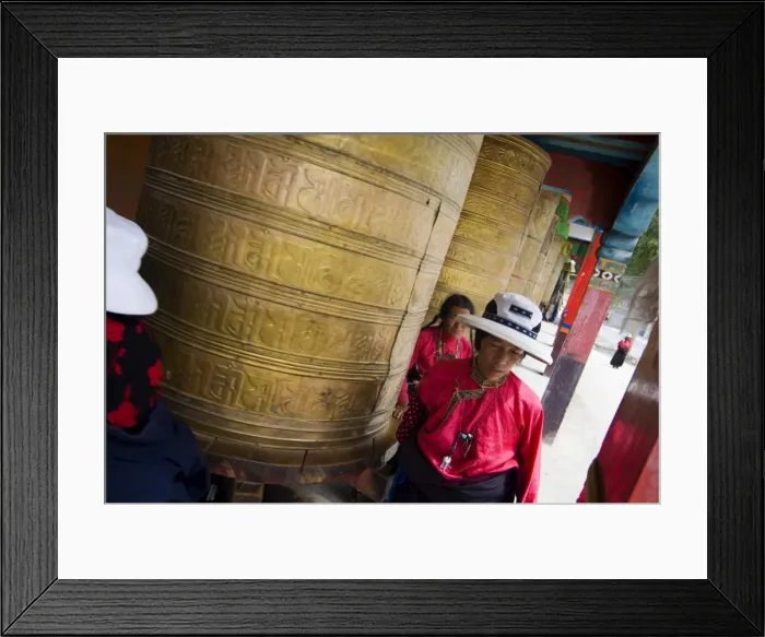 Framed Print : Turning large prayer wheels in temple, Yushu, Qinghai, China, Asia Framed Print : Turning large prayer wheels in temple, Yushu, Qinghai, China, Asia