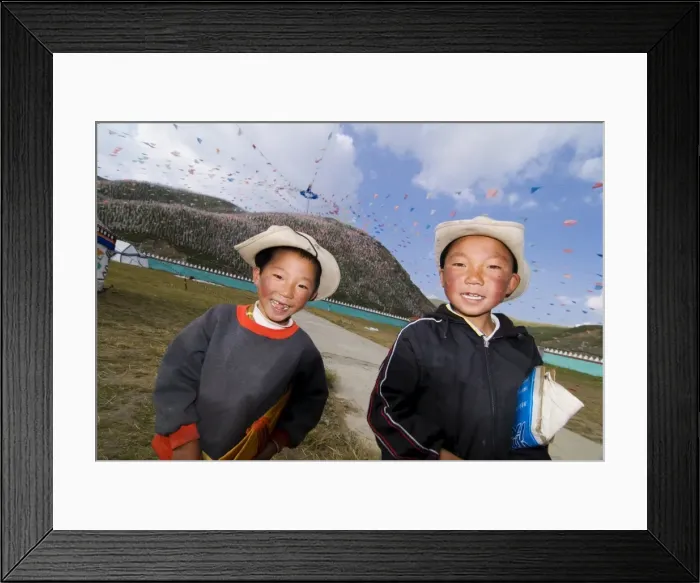 Framed Print : Two young boys and thousands of prayer flags, Tagong Grasslands, Sichuan, China, Asia Framed Print : Two young boys and thousands of prayer flags, Tagong Grasslands, Sichuan, China, Asia