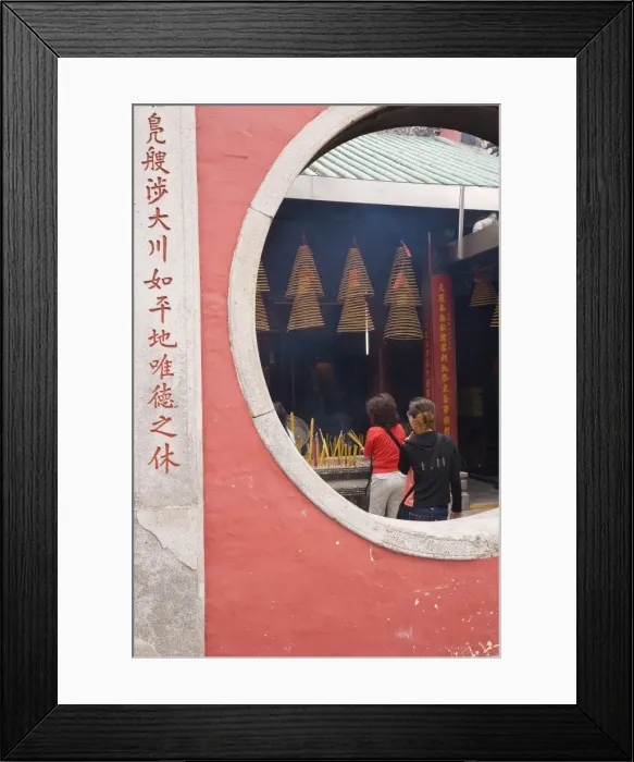 Framed Print : The A Ma Temple, incense hangs from the ceiling as worshippers pray and make offerings Framed Print : The A Ma Temple, incense hangs from the ceiling as worshippers pray and make offerings