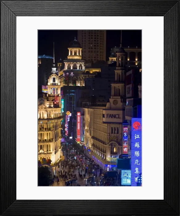 Framed Print : Elevated view along Nanjing Donglu Road illuminated with neon signs at night Framed Print : Elevated view along Nanjing Donglu Road illuminated with neon signs at night
