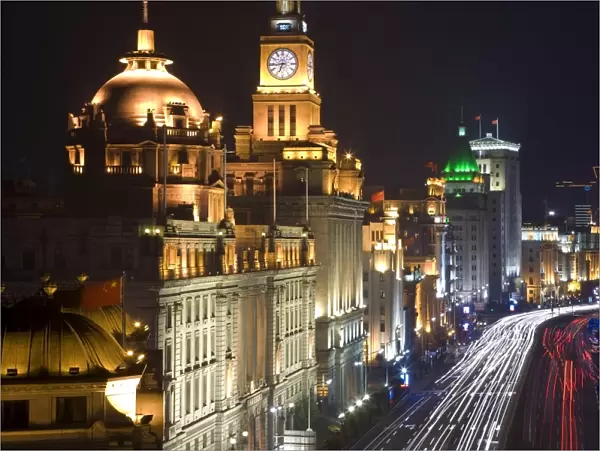 Historic buildings along Shanghais famous Bund promenade, illuminated at night