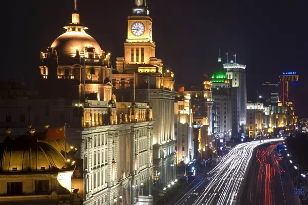 Historic buildings along Shanghais famous Bund promenade, illuminated at night