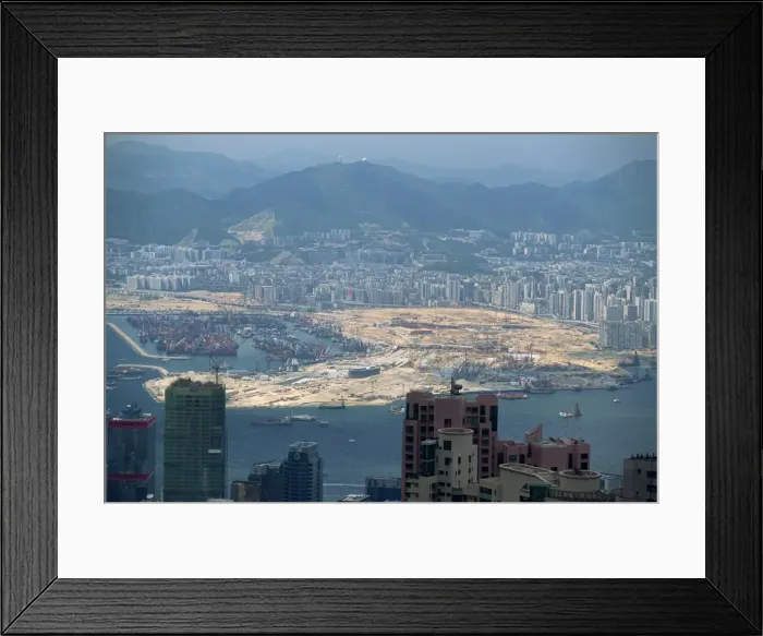 Framed Print : Construction site on reclaimed land in Kowloon in Victoria Harbour, Hong Kong Framed Print : Construction site on reclaimed land in Kowloon in Victoria Harbour, Hong Kong