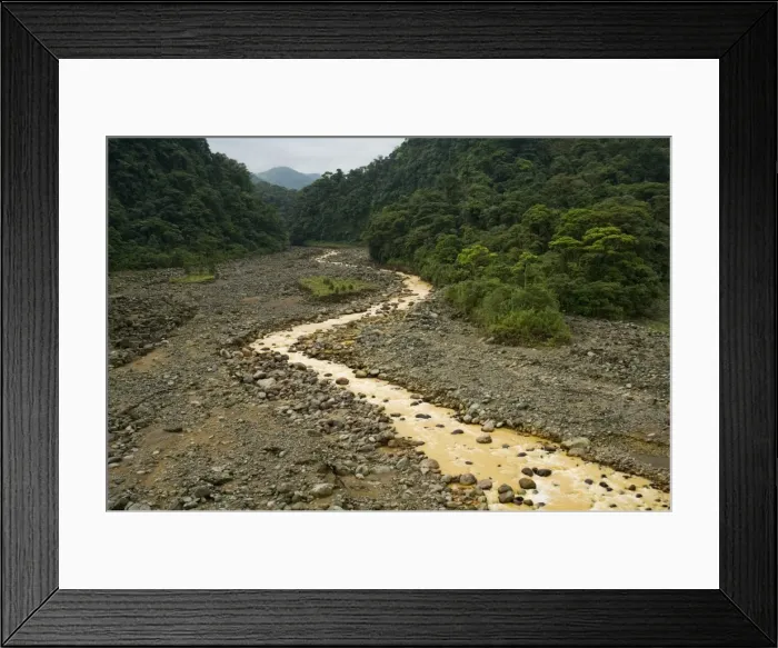 Framed Print : Brown water flowing from river fed with volcanic silt, Costa Rica Framed Print : Brown water flowing from river fed with volcanic silt, Costa Rica