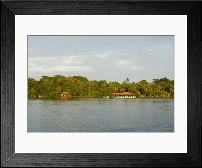 Framed Print : Eco Lodges on the canal at Tortuguero, Tortuguero National Park, Caribbean Coast Framed Print : Eco Lodges on the canal at Tortuguero, Tortuguero National Park, Caribbean Coast