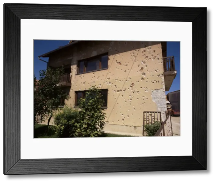 Framed Print : Scars of war on a house near Karlovac, Croatia, Europe Framed Print : Scars of war on a house near Karlovac, Croatia, Europe