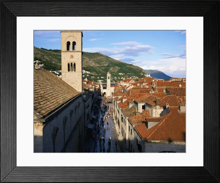 Framed Print : Elevated view along the pedestrian street of Placa to the clock tower, UNESCO World Heritage Site Framed Print : Elevated view along the pedestrian street of Placa to the clock tower, UNESCO World Heritage Site