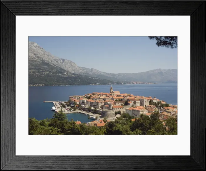Framed Print : Hilltop view of red tile rooftops of medieval Old Town and Bay, Korcula Island Framed Print : Hilltop view of red tile rooftops of medieval Old Town and Bay, Korcula Island