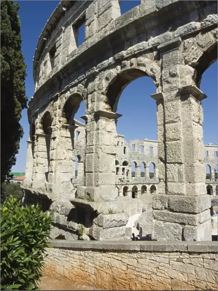 The 1st century Roman amphitheatre, columns and arched walls, Pula, Istria