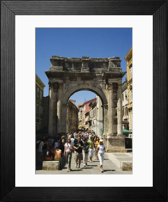 Framed Print : Tourists walking through stone arch in Old Town, Pula, Istria Coast, Croatia, Europe Framed Print : Tourists walking through stone arch in Old Town, Pula, Istria Coast, Croatia, Europe