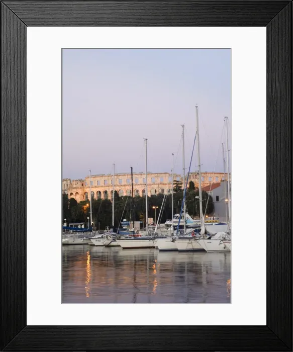 Framed Print : Evening light on harbour yachts, and 1st century Roman amphitheatre, Pula Framed Print : Evening light on harbour yachts, and 1st century Roman amphitheatre, Pula