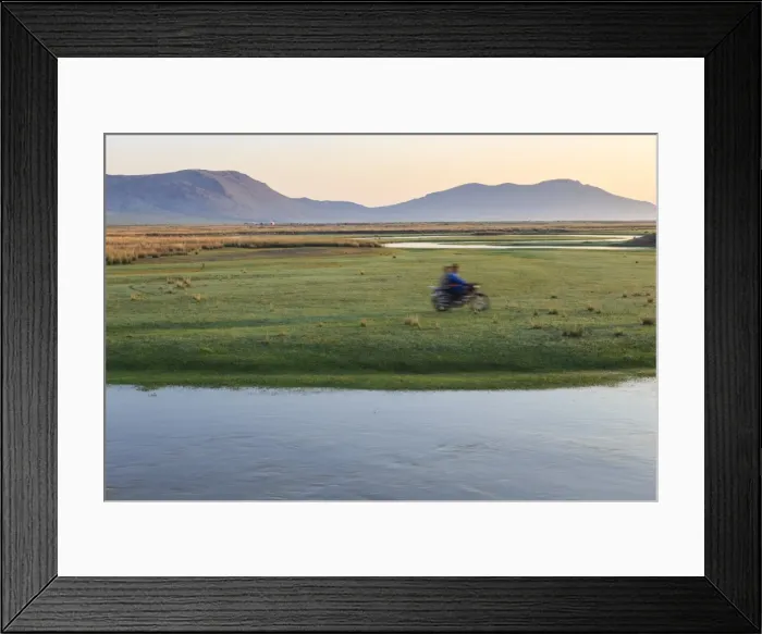 Framed Print : Nomads on motorcycle pass in a blur, river and distant gers, dawn, Nomad camp, Gurvanbulag Framed Print : Nomads on motorcycle pass in a blur, river and distant gers, dawn, Nomad camp, Gurvanbulag