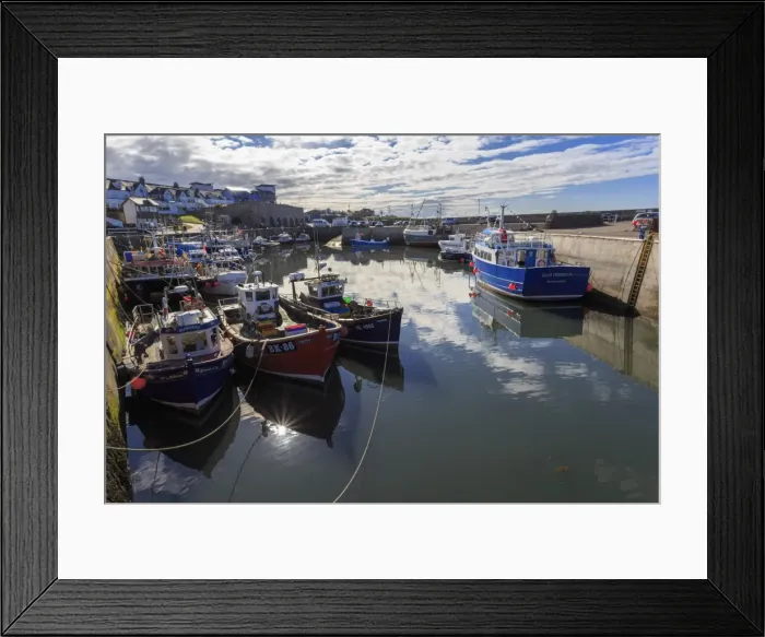 Framed Print : Colourful fishing boats in harbour and village beyond on a sunny summer evening, Seahouses Framed Print : Colourful fishing boats in harbour and village beyond on a sunny summer evening, Seahouses