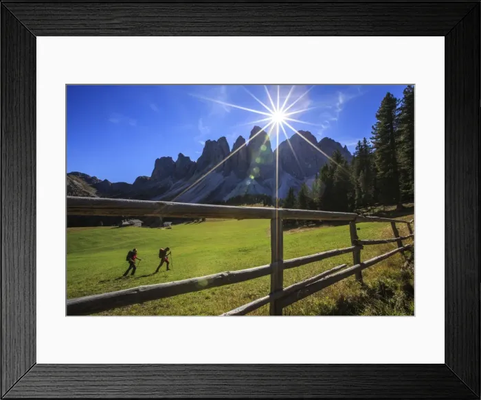 Framed Print : Hikers proceed from Glatsch Alm with Odle in background, Funes Valley, South Tyrol Framed Print : Hikers proceed from Glatsch Alm with Odle in background, Funes Valley, South Tyrol