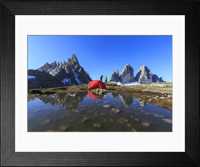 Framed Print : Hikers camped for the night admire the Three Peaks of Lavaredo on awakening, Sesto Framed Print : Hikers camped for the night admire the Three Peaks of Lavaredo on awakening, Sesto