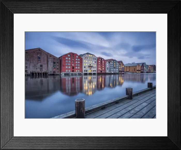 Framed Print : The lights of the houses reflected in the River Nidelva, Bakklandet, Trondheim, Norway Framed Print : The lights of the houses reflected in the River Nidelva, Bakklandet, Trondheim, Norway