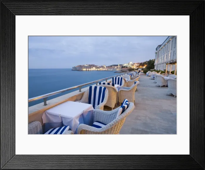 Framed Print : Evening view of patio overlooking harbour and waterfront, Excelsior Hotel Framed Print : Evening view of patio overlooking harbour and waterfront, Excelsior Hotel