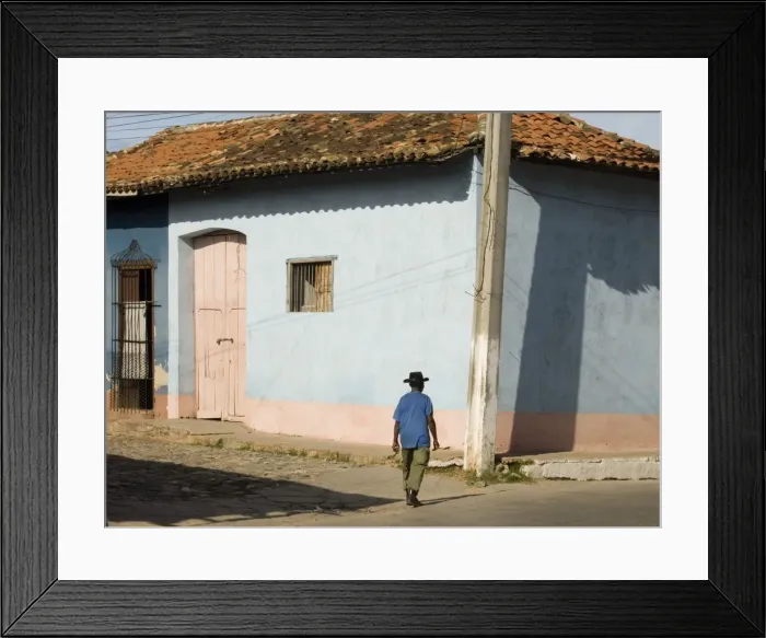 Framed Print : A man walking past colourfully painted houses in Trinidad, UNESCO World Heritage Site Framed Print : A man walking past colourfully painted houses in Trinidad, UNESCO World Heritage Site