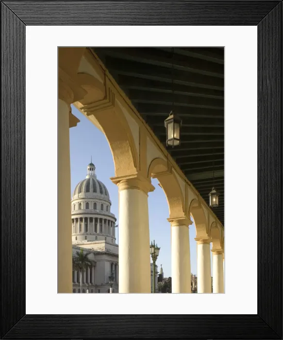 Framed Print : A view of the Capitolio seen through the arches of a colonial style arcade in central Havana Framed Print : A view of the Capitolio seen through the arches of a colonial style arcade in central Havana