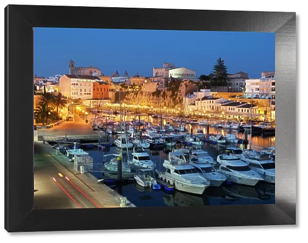 View over harbour and Ayuntamiento de Ciutadella at night, Ciutadella, Menorca, Balearic Islands