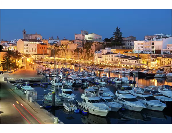 View over harbour and Ayuntamiento de Ciutadella at night, Ciutadella, Menorca, Balearic Islands