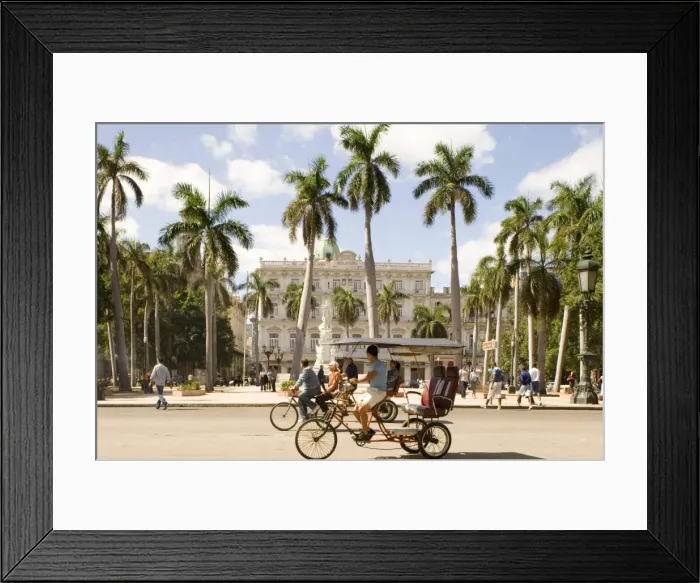 Framed Print : Cyclo-taxis passing the Parque Central, Central Havana, Cuba, West Indies Framed Print : Cyclo-taxis passing the Parque Central, Central Havana, Cuba, West Indies