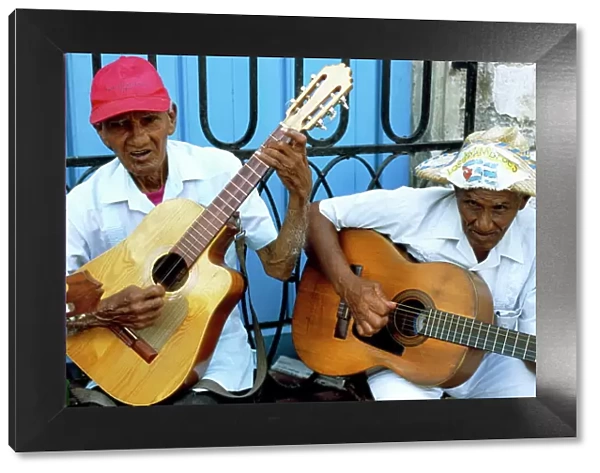 Musicians playing guitars, Havana Viejo, Havana, Cuba, West Indies, Central America