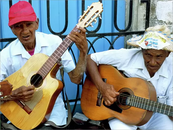 Musicians playing guitars, Havana Viejo, Havana, Cuba, West Indies, Central America