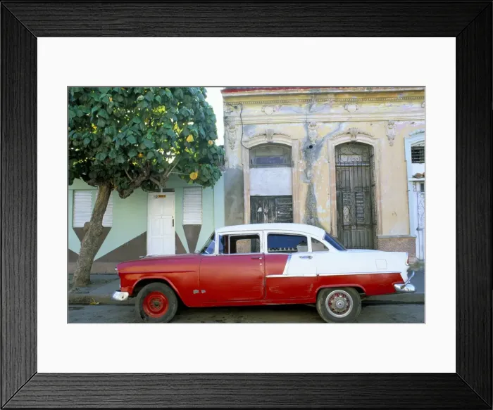 Framed Print : Old American car parked on street beneath fruit tree, Cienfuegos, Cuba Framed Print : Old American car parked on street beneath fruit tree, Cienfuegos, Cuba