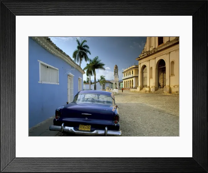 Framed Print : View across Plaza Mayor with old American car parked on cobbles, Trinidad Framed Print : View across Plaza Mayor with old American car parked on cobbles, Trinidad