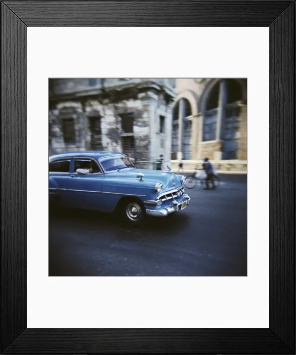 Framed Print : Panned shot of an old blue American car, Havana, Cuba, West Indies, Central America Framed Print : Panned shot of an old blue American car, Havana, Cuba, West Indies, Central America