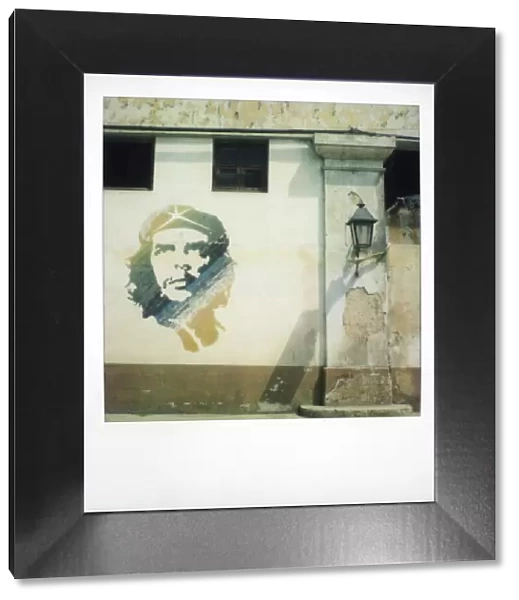 Polaroid of mural of Che Guevara painted on wall, Havana, Cuba, West Indies