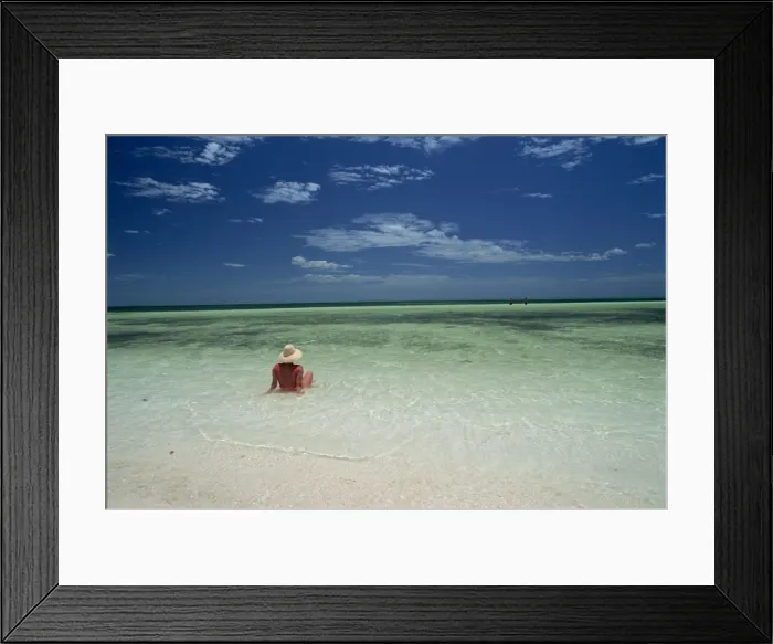 Framed Print : Woman in the sea on the beach at Cayo Coco on the island of Cuba, West Indies Framed Print : Woman in the sea on the beach at Cayo Coco on the island of Cuba, West Indies