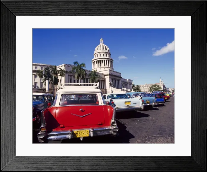 Framed Print : Street scene of taxis parked near the Capitolio Building in Central Havana Framed Print : Street scene of taxis parked near the Capitolio Building in Central Havana