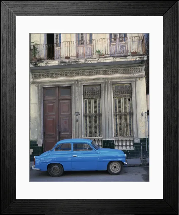 Framed Print : A blue car parked outside a shabby house in Old Havana, Cuba, West Indies Framed Print : A blue car parked outside a shabby house in Old Havana, Cuba, West Indies